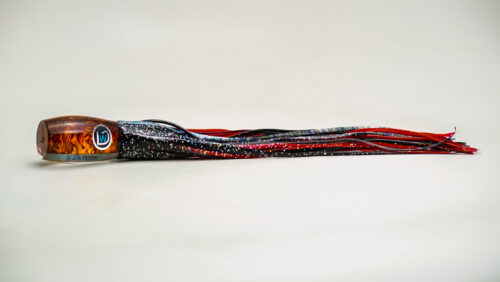 A long red and black tube with a white stripe