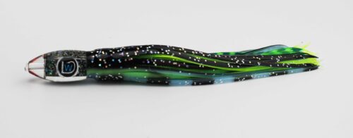 A close up of the end of a long green and black hair extension.